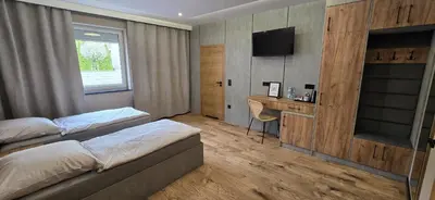 Łóżko lub łóżka w pokoju w obiekcie KaMi Self check-in 24 h