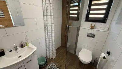 Łazienka w obiekcie Domki Wilcza B