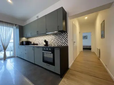 Kuchnia lub aneks kuchenny w obiekcie APARTAMENT POLANICA RESIDENCE Nr 1