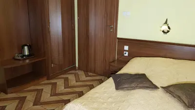 Łóżko lub łóżka w pokoju w obiekcie Pokoje Gościnne Akacja