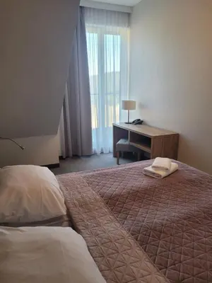 Łóżko lub łóżka w pokoju w obiekcie Aparthotel Apartamenty Czarna Góra 409