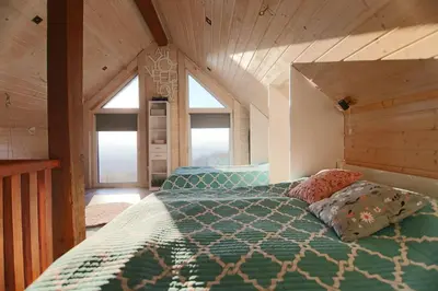 Łóżko lub łóżka w pokoju w obiekcie Cottage on Kukułka