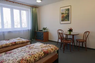 Łóżko lub łóżka w pokoju w obiekcie Dom Studencki Labirynt