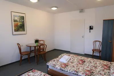 Łóżko lub łóżka w pokoju w obiekcie Dom Studencki Labirynt