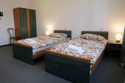 Łóżko lub łóżka w pokoju w obiekcie Dom Studencki Labirynt