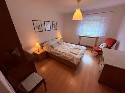 Łóżko lub łóżka w pokoju w obiekcie Apartament Złota Woda