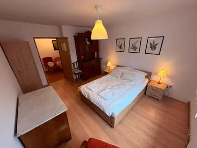 Łóżko lub łóżka w pokoju w obiekcie Apartament Złota Woda