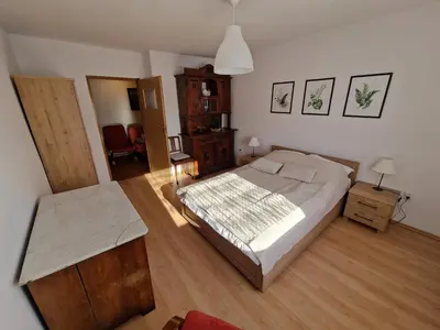 Łóżko lub łóżka w pokoju w obiekcie Apartament Złota Woda
