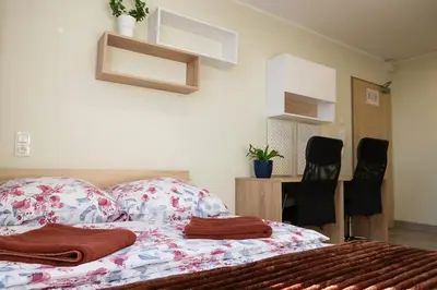 Łóżko lub łóżka w pokoju w obiekcie Dom Studencki Arka