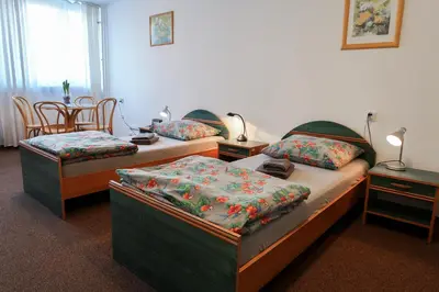 Łóżko lub łóżka w pokoju w obiekcie Dom Studencki Raj