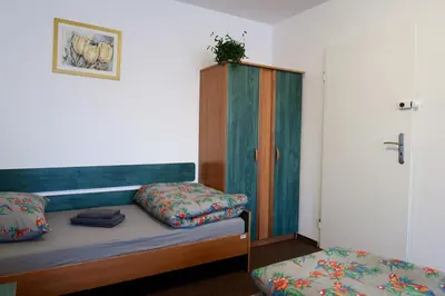 Łóżko lub łóżka w pokoju w obiekcie Dom Studencki Raj