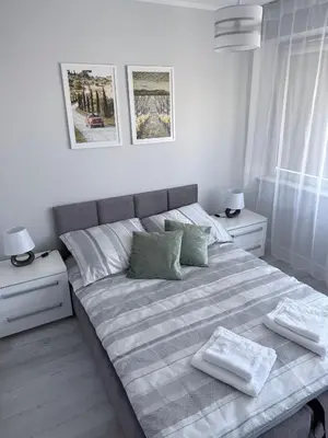 Łóżko lub łóżka w pokoju w obiekcie Studio 19 Podmiejska