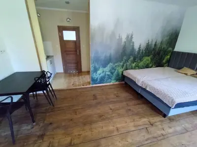 Łóżko lub łóżka w pokoju w obiekcie Stara Plebania