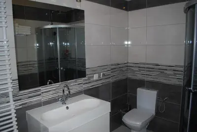 Łazienka w obiekcie Apartament Zwyciezcow