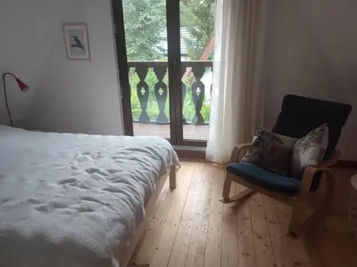 Łóżko lub łóżka w pokoju w obiekcie Sulistrowiczki Kwiatowa 3