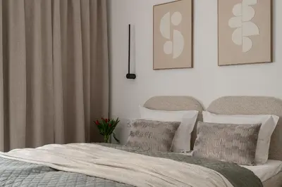 Łóżko lub łóżka w pokoju w obiekcie INA Rent - Apartamenty Czysta Delux