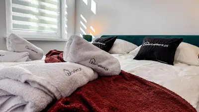 Łóżko lub łóżka w pokoju w obiekcie Apartament Mickiewicza by LibertaRent