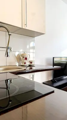 Kuchnia lub aneks kuchenny w obiekcie Apartament Mickiewicza by LibertaRent