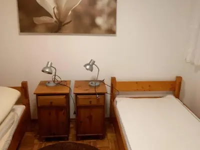 Łóżko lub łóżka w pokoju w obiekcie Agroturystyka Dom pod Kalenicą