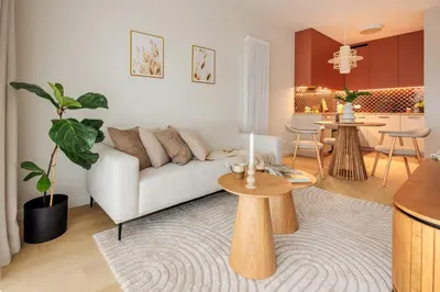 Część wypoczynkowa w obiekcie Kępa Mieszczańska Deluxe Studio by BookingHost