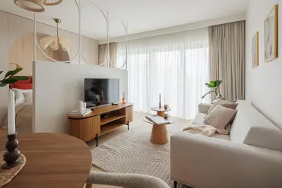 Telewizja i/lub zestaw kina domowego w obiekcie Kępa Mieszczańska Deluxe Studio by BookingHost