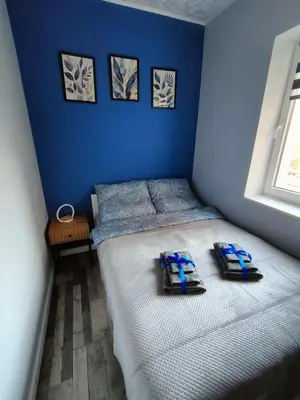 Łóżko lub łóżka w pokoju w obiekcie 722 Slate Apartament Jedlina-Zdrój