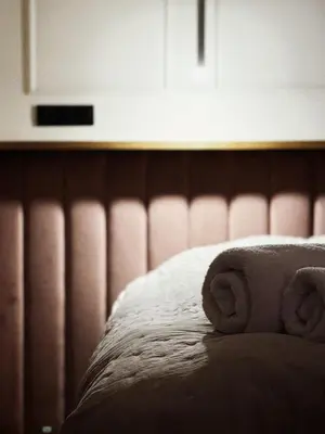 Łóżko lub łóżka w pokoju w obiekcie Apartament Nowy Swiat