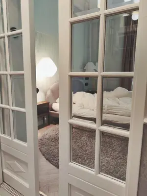 Łóżko lub łóżka w pokoju w obiekcie Apartament Nowy Swiat