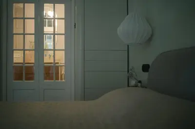 Łóżko lub łóżka w pokoju w obiekcie Apartament Nowy Swiat