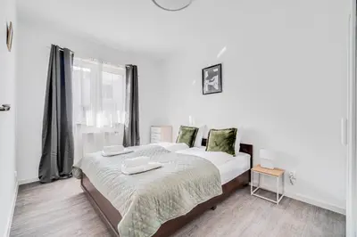Łóżko lub łóżka w pokoju w obiekcie Drabika 46 by Homeprime