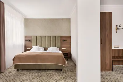 Łóżko lub łóżka w pokoju w obiekcie Hotel Sylwia