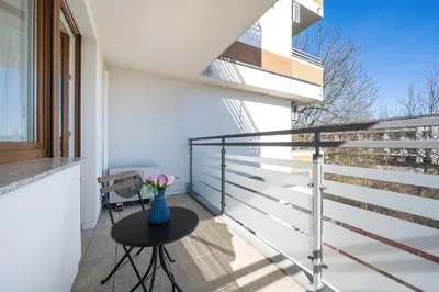 Balkon lub taras w obiekcie Wyjątkowy Apartament z Parkingiem by Noclegi Renters