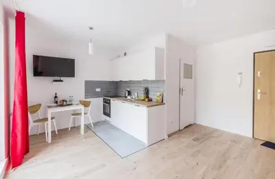 Kuchnia lub aneks kuchenny w obiekcie Red Apartment