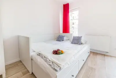 Łóżko lub łóżka w pokoju w obiekcie Red Apartment