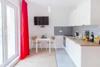 Kuchnia lub aneks kuchenny w obiekcie Red Apartment
