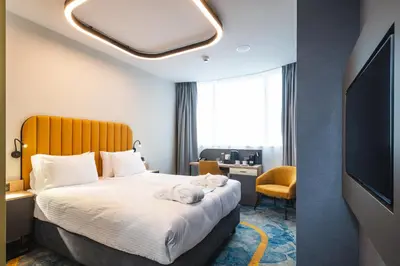 Łóżko lub łóżka w pokoju w obiekcie Focus Hotel Premium Wrocław