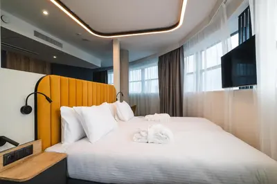 Łóżko lub łóżka w pokoju w obiekcie Focus Hotel Premium Wrocław