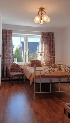 Łóżko lub łóżka w pokoju w obiekcie Złoty Trakt pokoje i rowery