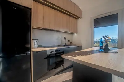 Kuchnia lub aneks kuchenny w obiekcie Apartament z ogródkiem PW Invest Home