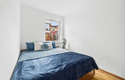 Łóżko lub łóżka w pokoju w obiekcie Apartament Vivaldiego