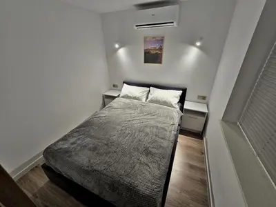 Łóżko lub łóżka w pokoju w obiekcie Apartamenty nad Kamiennym Potokiem 2