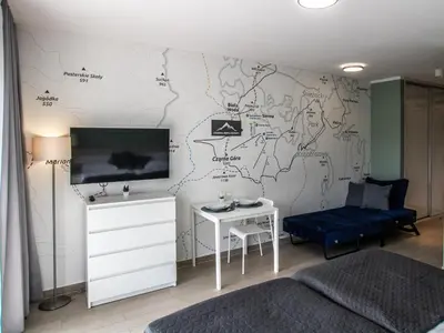 Telewizja i/lub zestaw kina domowego w obiekcie Apartamenty Czarna Góra Resort - Livigno 1 i 2