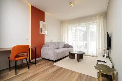 Część wypoczynkowa w obiekcie Amber & Wood Harmony by UniqueRent