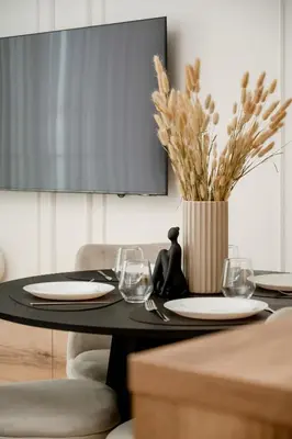 Telewizja i/lub zestaw kina domowego w obiekcie Stylowy Apartament z Balkonem i Wanną by Noclegi Renters