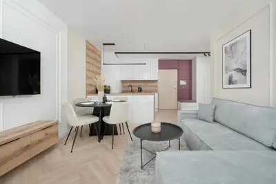 Część wypoczynkowa w obiekcie Stylowy Apartament z Balkonem i Wanną by Noclegi Renters