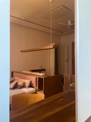 Łóżko lub łóżka w pokoju w obiekcie visitting apartments - Gwarna
