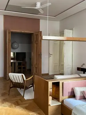 Łóżko lub łóżka w pokoju w obiekcie visitting apartments - Gwarna