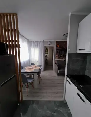 Kuchnia lub aneks kuchenny w obiekcie Apartament Gwiezdna 15