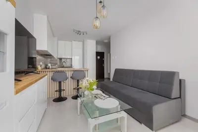 Kuchnia lub aneks kuchenny w obiekcie Nowoczesny Apartament w Gliwicach z Umeblowanym Balkonem by Noclegi Renters