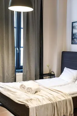 Łóżko lub łóżka w pokoju w obiekcie Central Wroclaw Apartment - Great Location -Kosciuszki